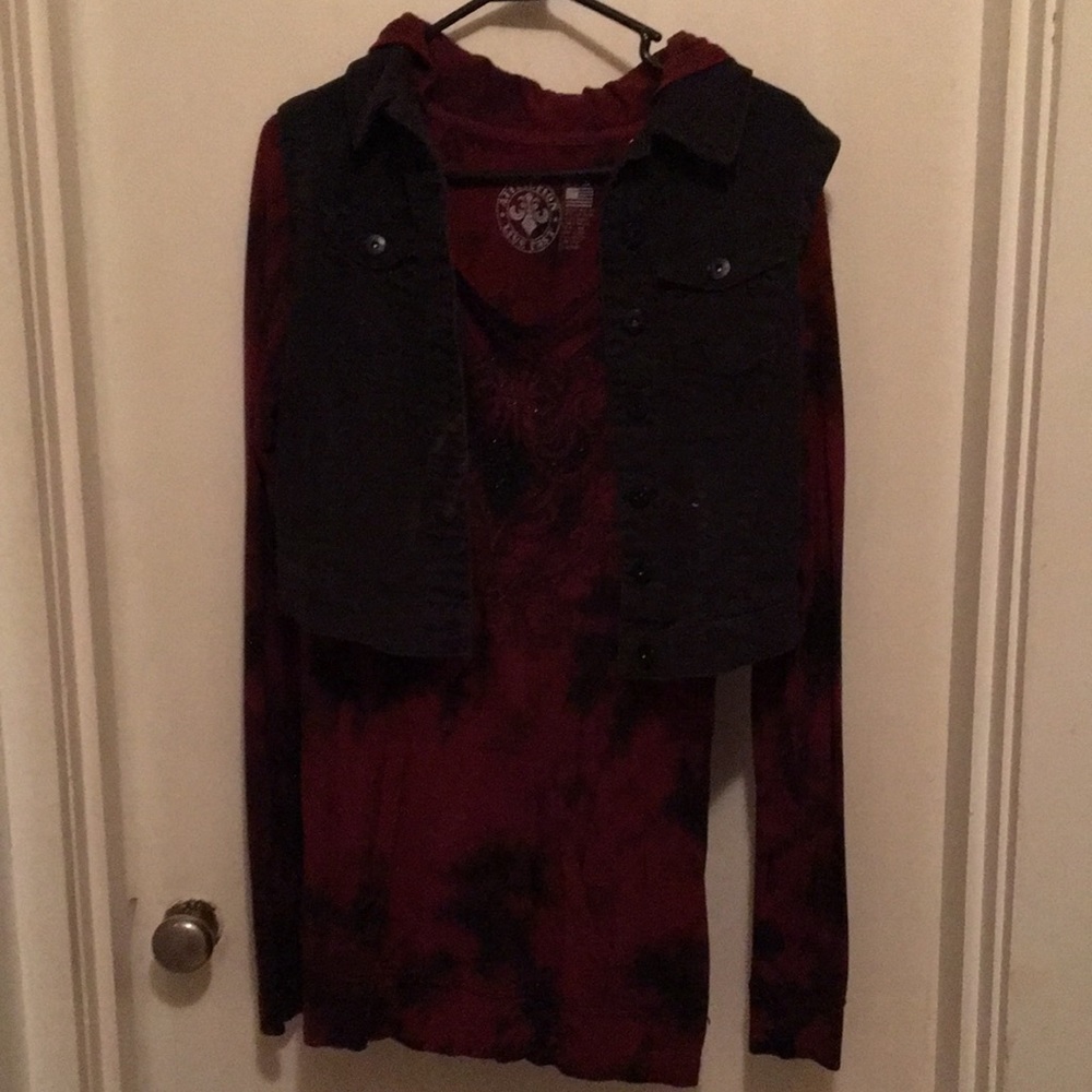 The Buckle, long shirt, with hood, and vest.